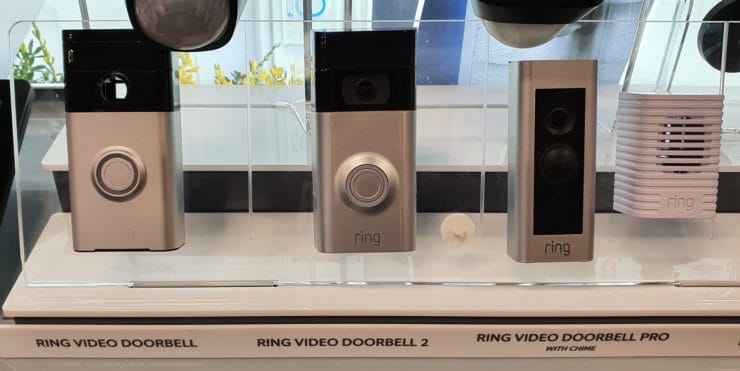Three Ring doorbells side-by-side in a store.