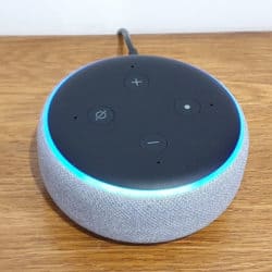 Echo Dot 3rd generation model, with a blue 'listening' ring after a voice command was issued.