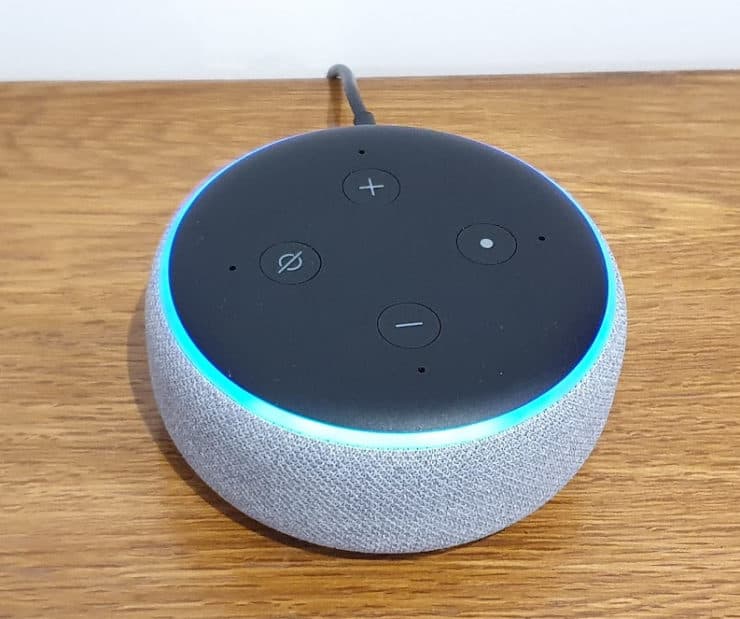 Echo Dot 3rd generation model, with a blue 'listening' ring after a voice command was issued.