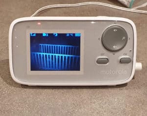 Photo of a turned-on motorola baby monitor with 2.5" video screen.