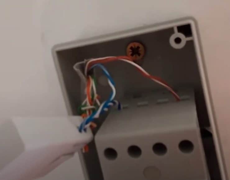 A close-up look at the output cables at the top of the Ring transformer, with position "1" going through the Pro Power Kit V2, and position "4" coming straight from the output (doorbell) cable.
