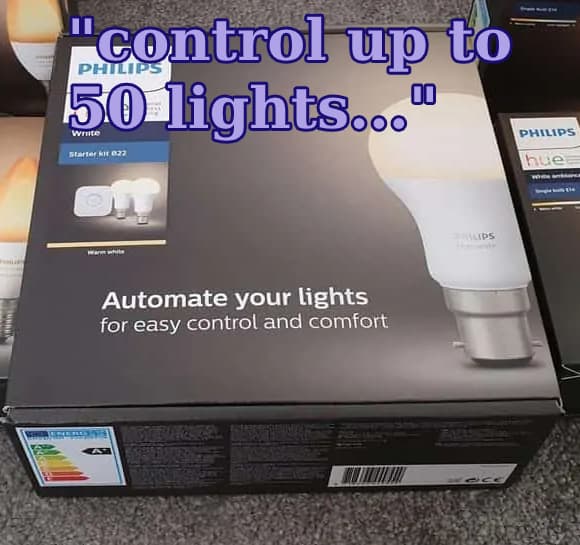 A Philips Hue starter kit, with the text "control up to 50 lights..." overlayed on it.