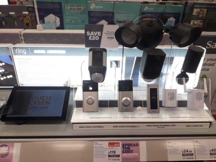 Various Ring doorbells and cameras in a UK store.