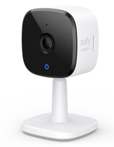Marketing image of the eufy indoor camera on a stand, with blue LED showing.
