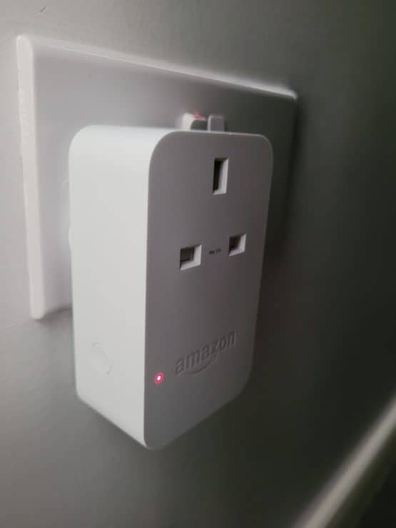 The Amazon Smart Plug with a red LED and the physical on off side button