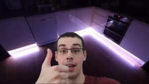 YouTube video showing my smart light strips in the background of my kitchen, and me in the foreground