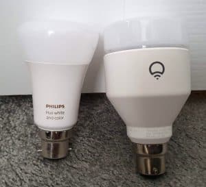 Two full RGB smart bulbs from Hue and LIFX side by side
