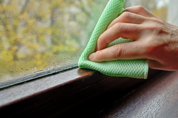 Cleaning water condensation off a window