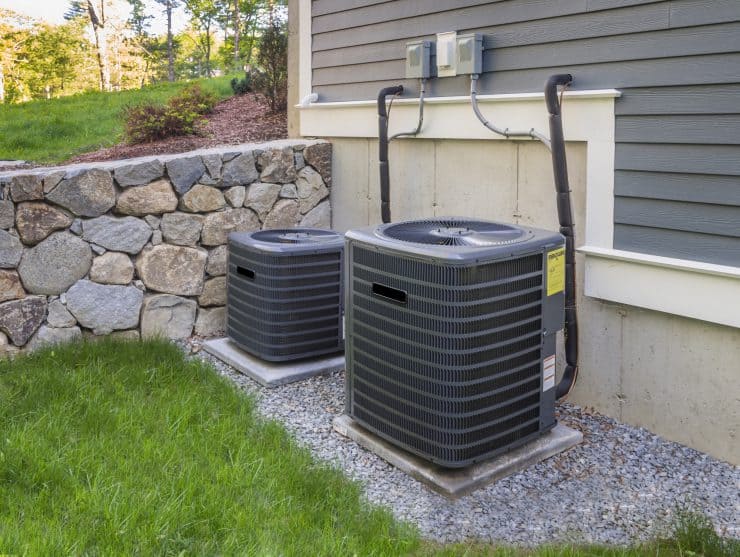 Outdoor HVAC units with fans at the top