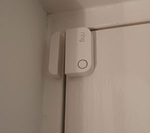 A Ring Contact Sensor installed on my front door