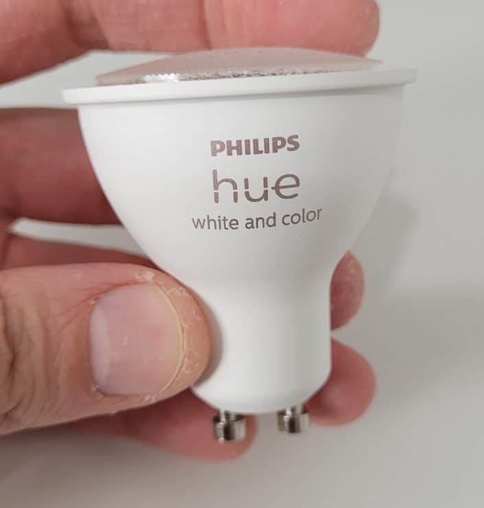 Me holding one of my Hue GU10 color smart bulbs