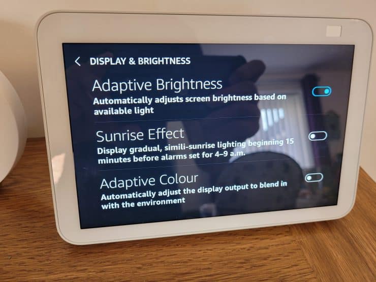 The adaptive brightness sunrise effect and adaptive color options on an Echo Show 8