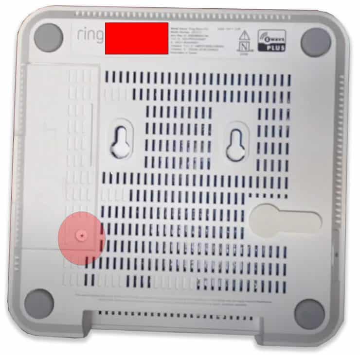 The back of the Ring Alarm Pro with the battery screw hole highlighted