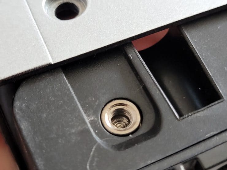 A close up view of the security screw slot on a Ring doorbell showing it is fairly shallow
