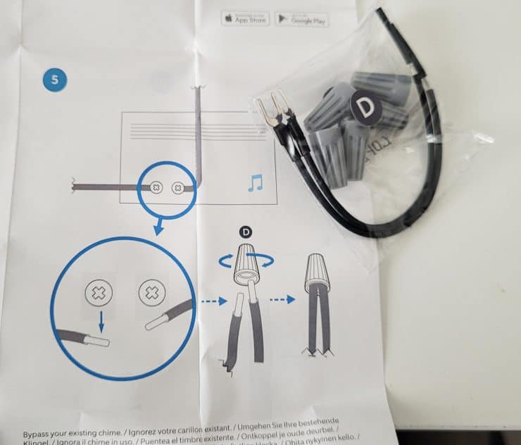 The included jumper bypass cable and kit in a Ring Doorbell box