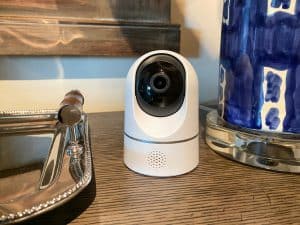 A Eufy Indoor Camera sitting on a living room table