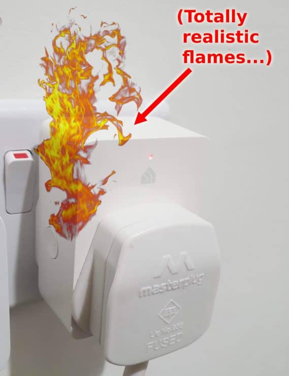 A Kasa Smart Plug with totally realistic flames coming out of it (not Photoshopped at all...)