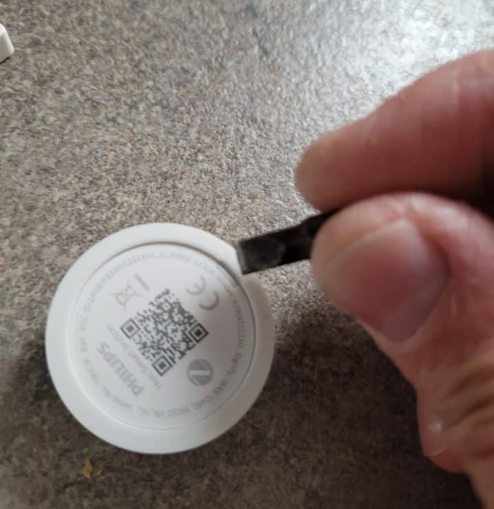 Opening a Hue Smart Button requires using a flat head screwdriver. or similar tool