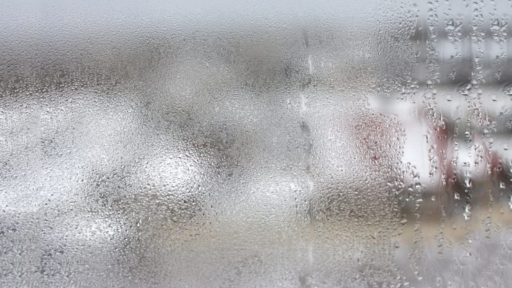 A room with too much humidity resulting in condensation on the glass