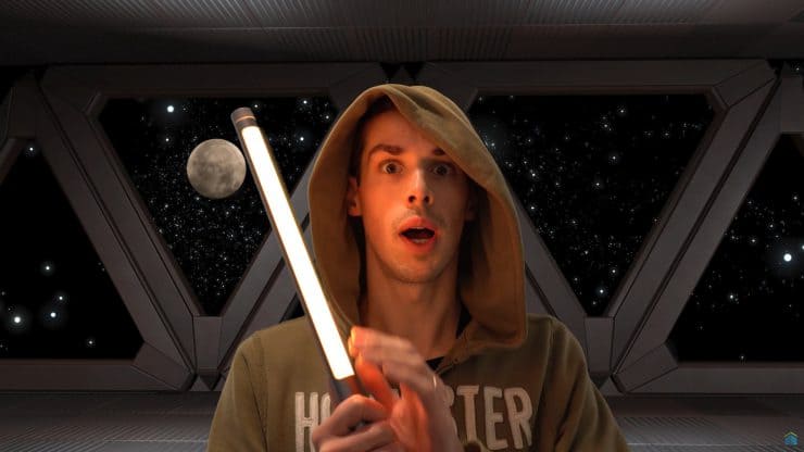 Me holding The Boring Lamp and pretending to be a Jedi Knight